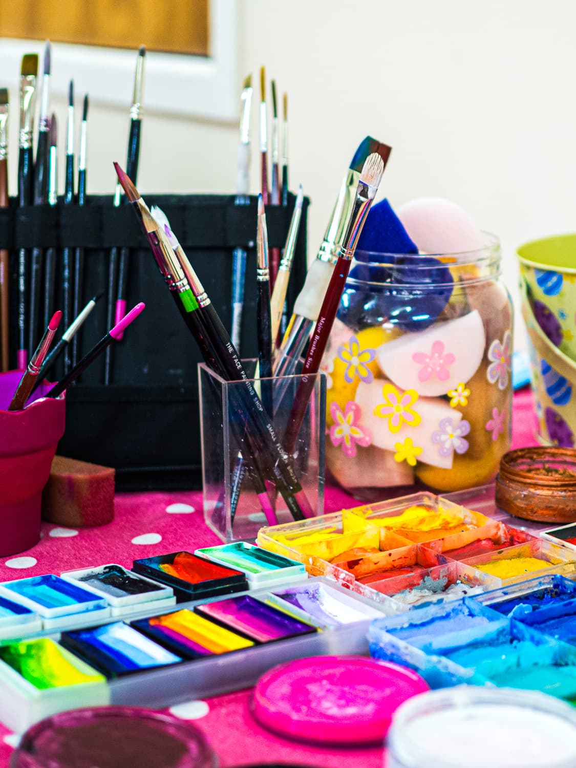 Close up of face painting brushes and paints