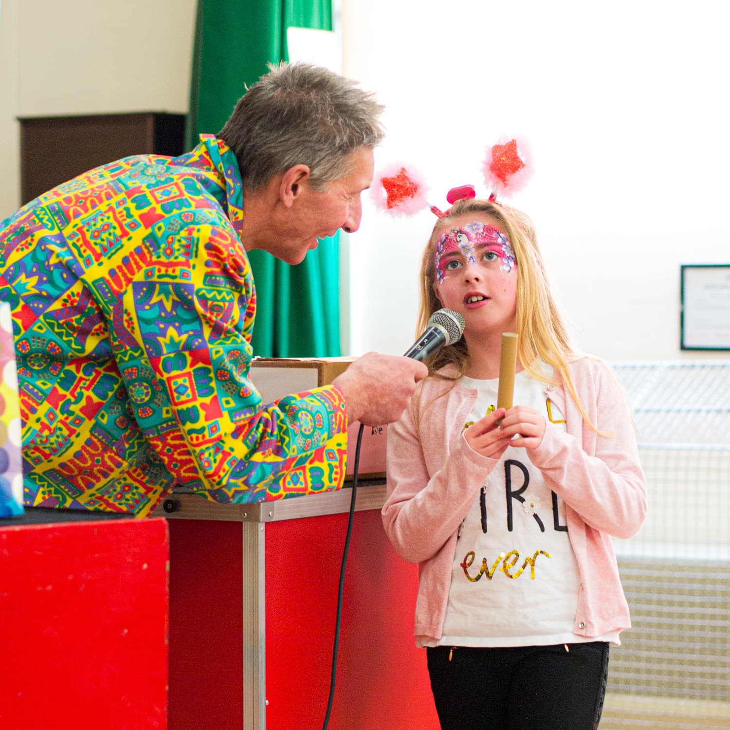 A child talking into a mic