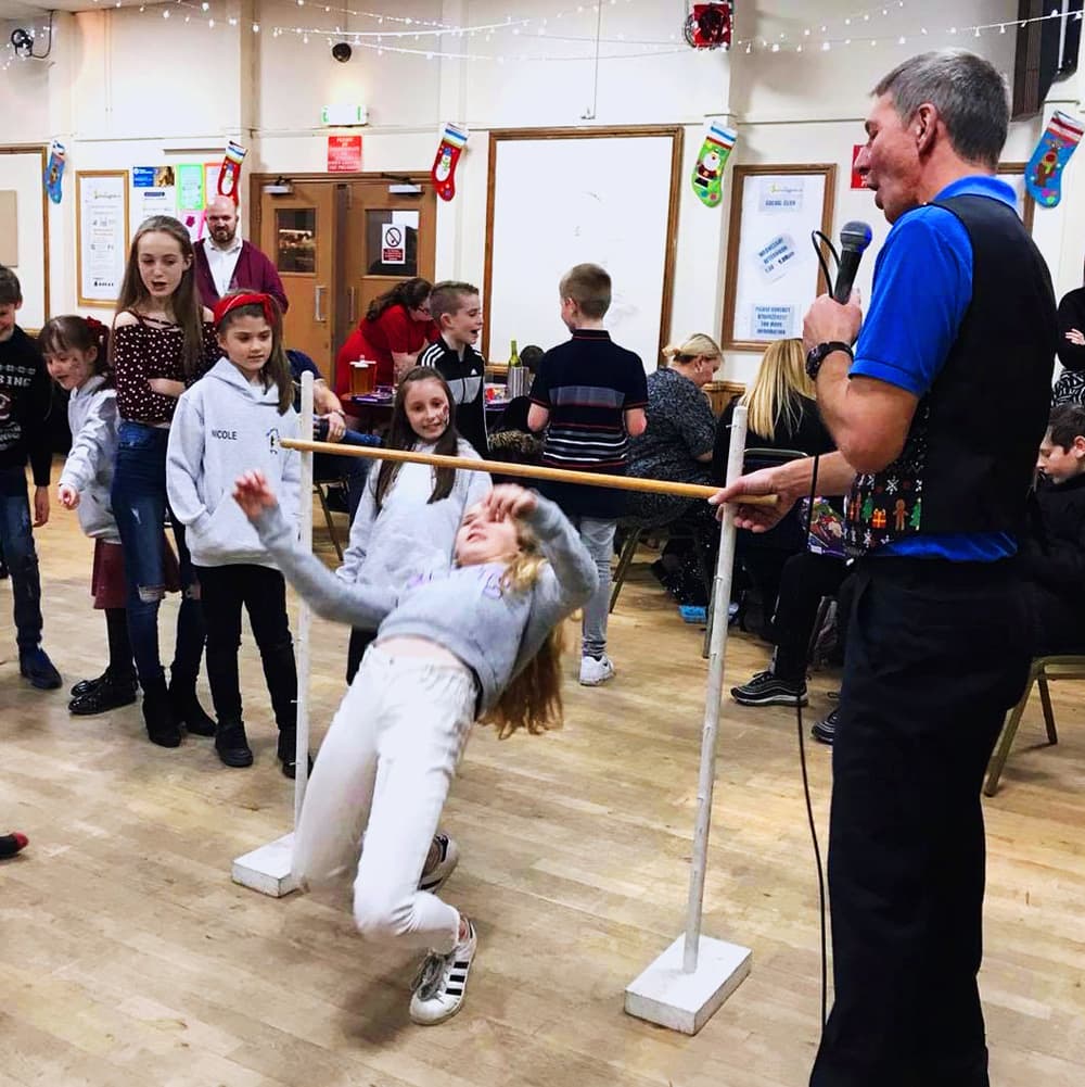Children playing the limbo