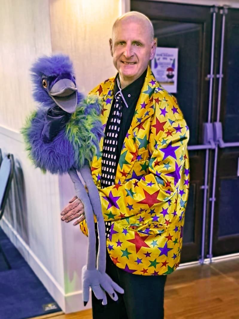 A colourful bird puppet